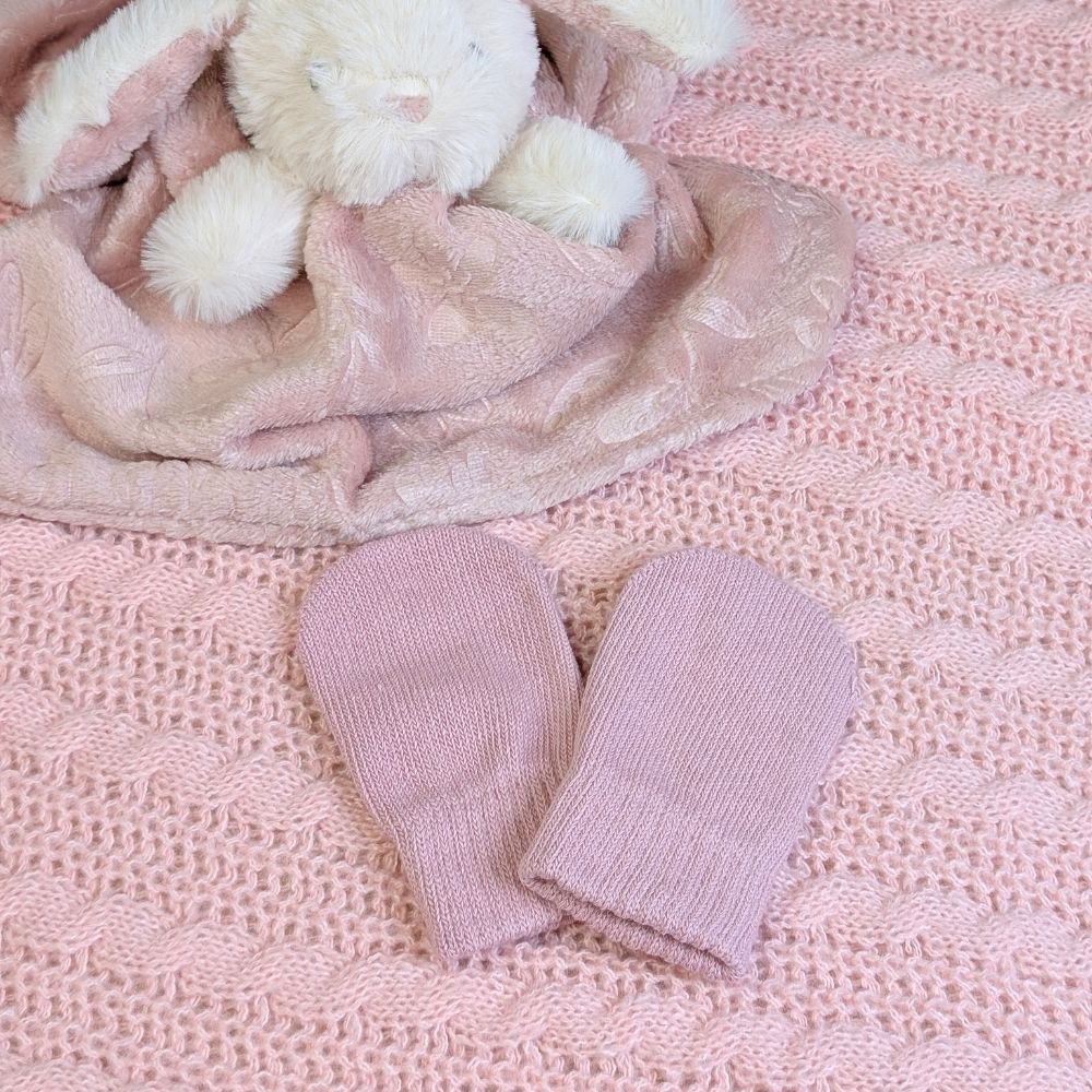 Dusky pink knit baby mittens