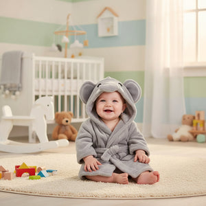 A soft grey baby bath robe dressing gown with an elephant face on the hood