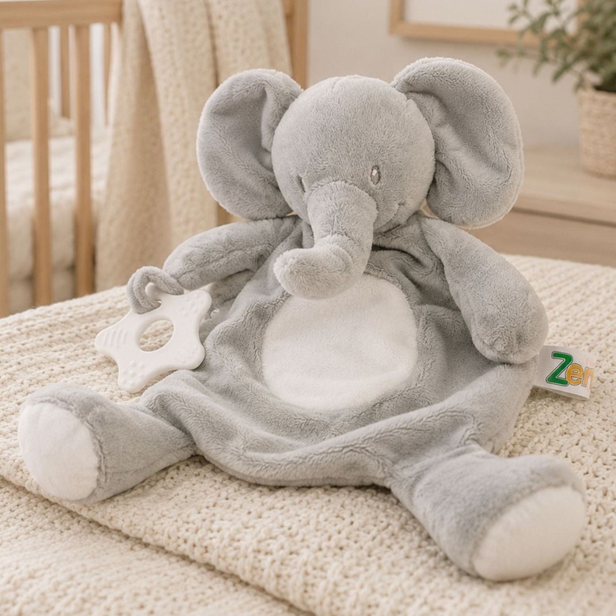 Gray baby comforter elephant toy with under stuffed body and teething silicon