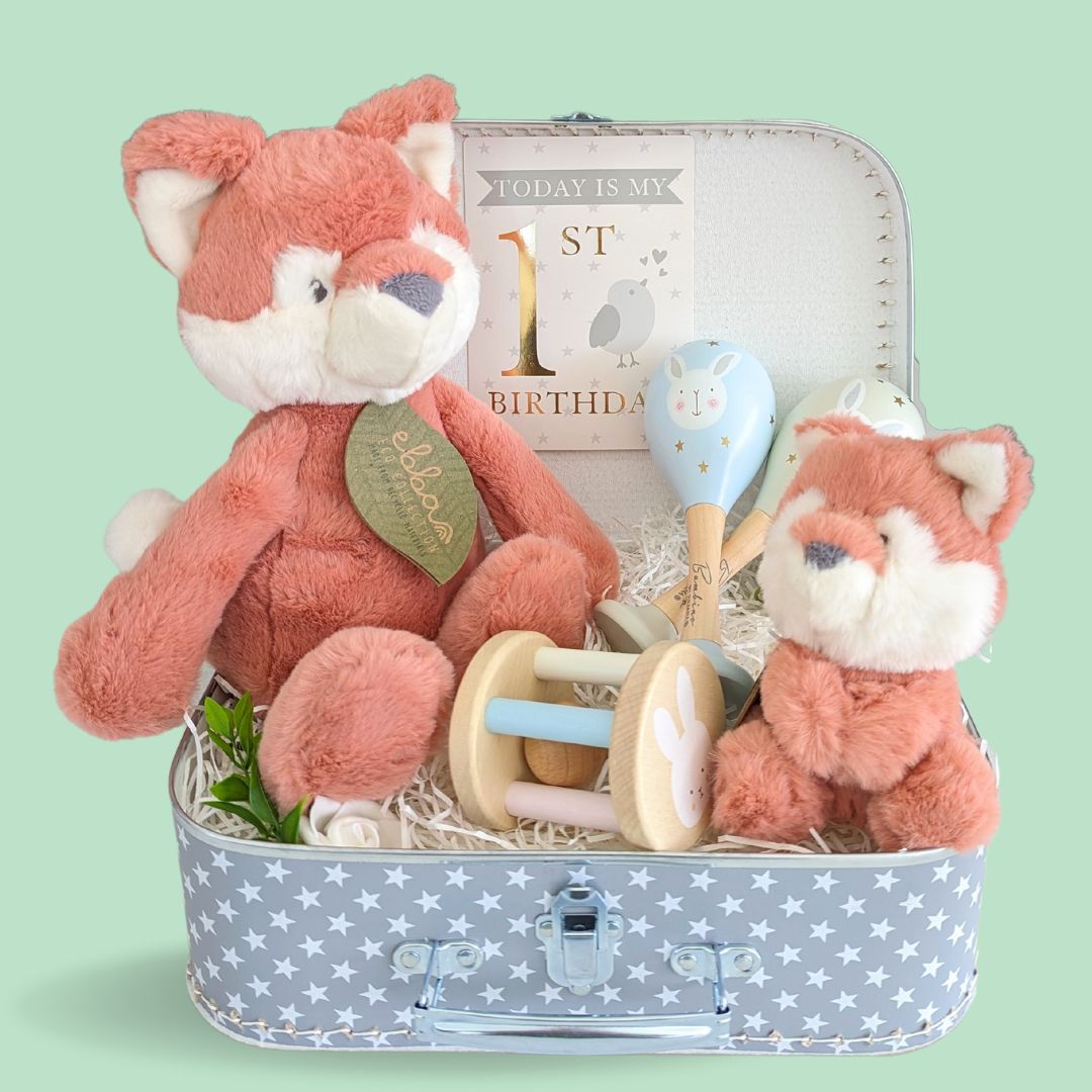 Adorable first birthday gift for a baby. Includes an eco baby soft toy, franic fox, with her cub rattle, maracas and wooden sensory toy. Made from recycled plastics. 