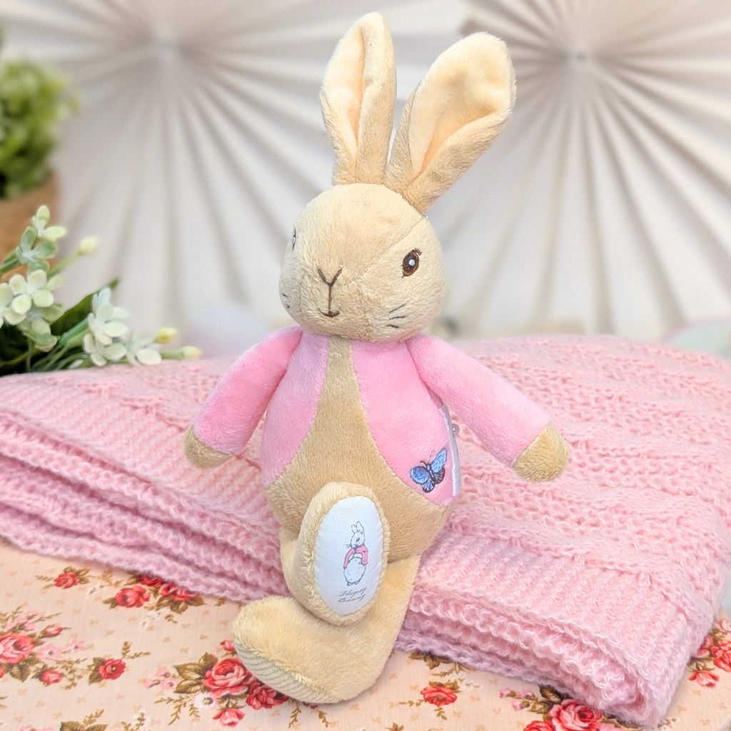 Pink flopsy bunny bean rattle for a baby girl.