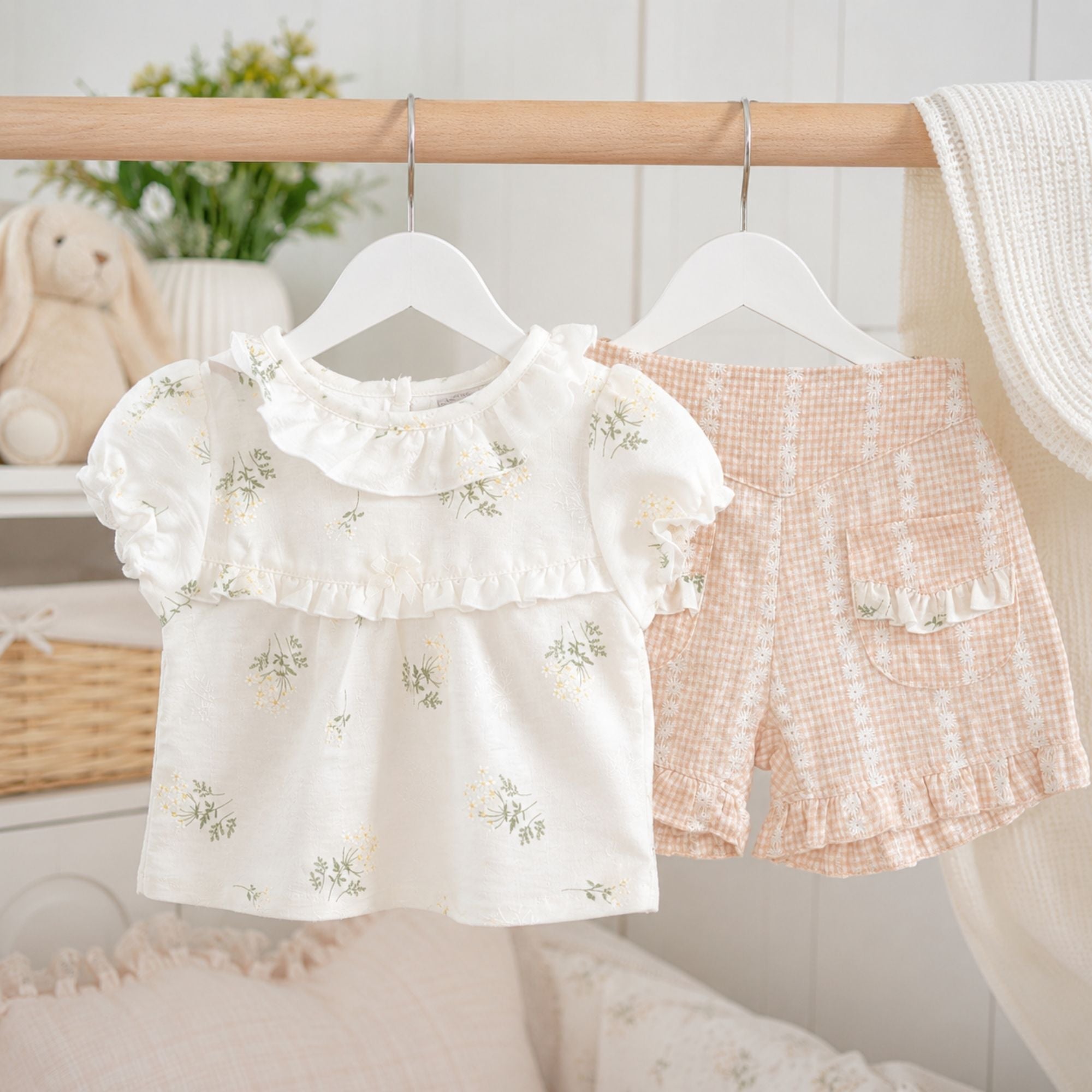 Baby girl floral summer outfit with cream embroidered top and pink gingham shorts, lightweight two piece baby clothes set