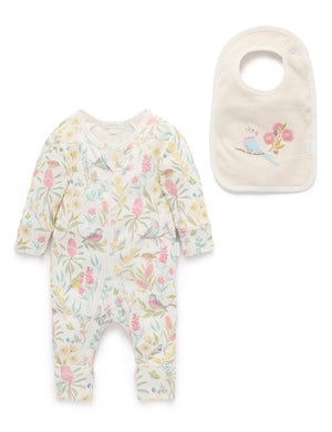 Flower Garden baby zip baby grow suit in organic cotton with floral print and matching reversible bib. Soft baby clothes set.