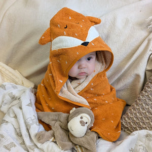 Organic hooded baby bath towel in orange fox design.