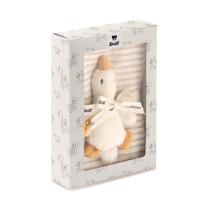 Gilda goose rattle and striped cotton burp cloth displayed inside a windowed gift box with a ribbon.
