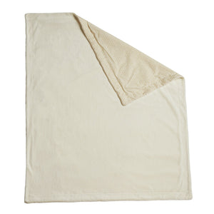 Cream baby blanket alone with its patterned reverse visible at the folded corner.