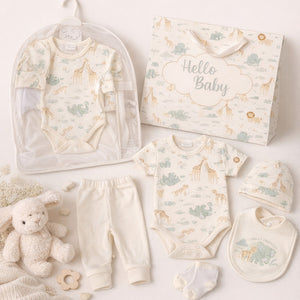 Great Friends baby clothes set with safari print bodysuit, trousers, hat, bib and socks in soft neutral tones.