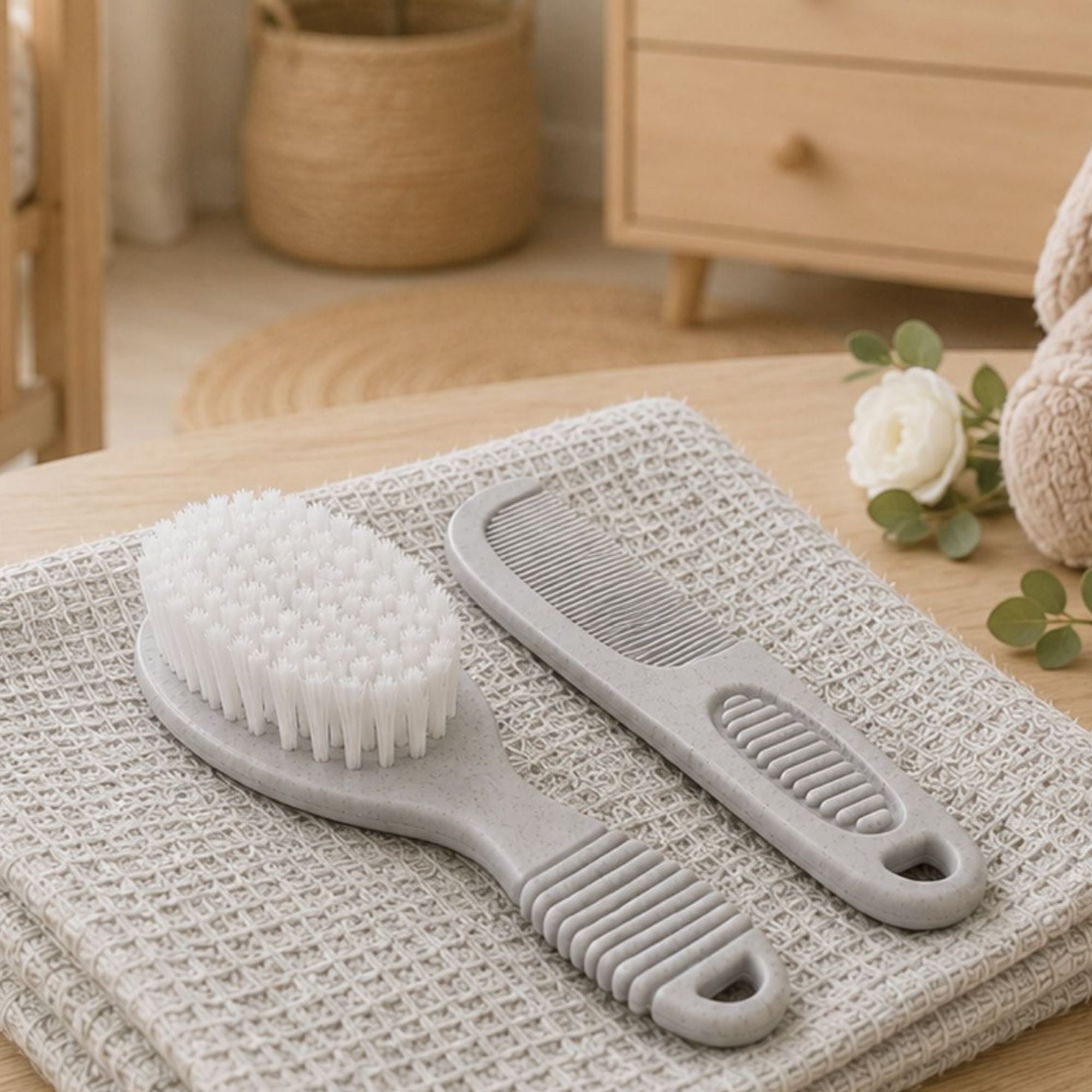 Grey baby brush and comb set made from recycled materials