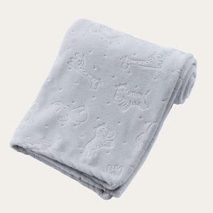 Folded gray blanket with safari animal pattern