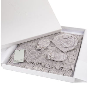 Grey knitted baby set including a hat, mittens and shawl in presentation box.