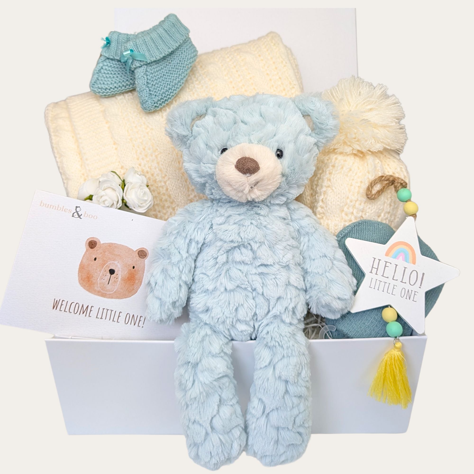 New baby hamper box with gifts including mint teddy and newborn essentials by Bumbles and Boo.