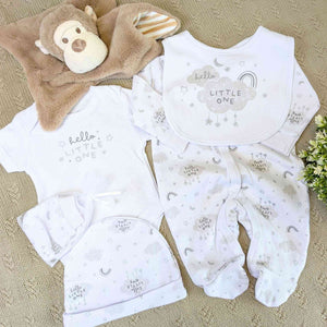 Baby clothing set with bib, hat, and romper in white