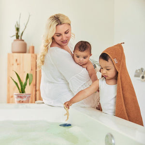 Kids Terry towelling bath towel with hood in orange caramel colour