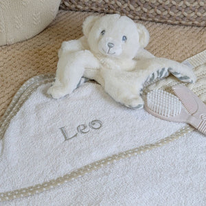 Baby bath towel with a hood which can be personalised.