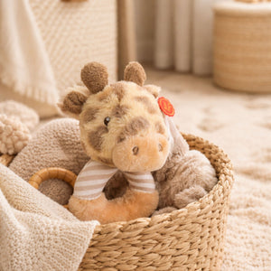 A baby rattle giraffe made from recycled materials