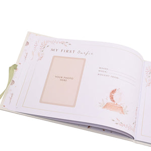My First Outfit page in the baby record book, with a photo space and written prompts.