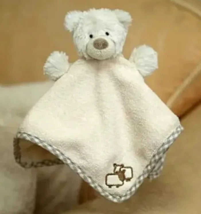 Cream comforter with white bear