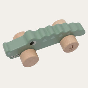 Eco-friendly wooden crocodile toy with wheels â