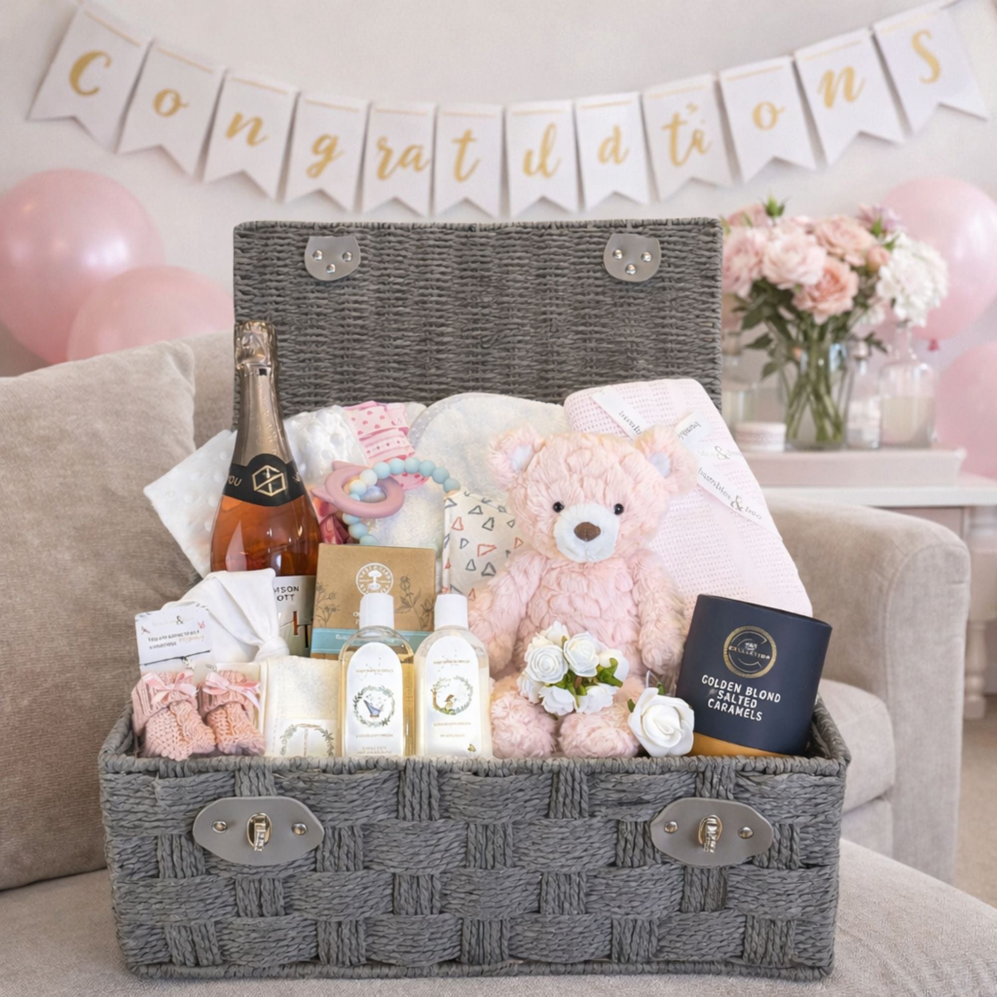 Large hamper for a new mother with lots of gifts. Includes presents for both mum and baby.