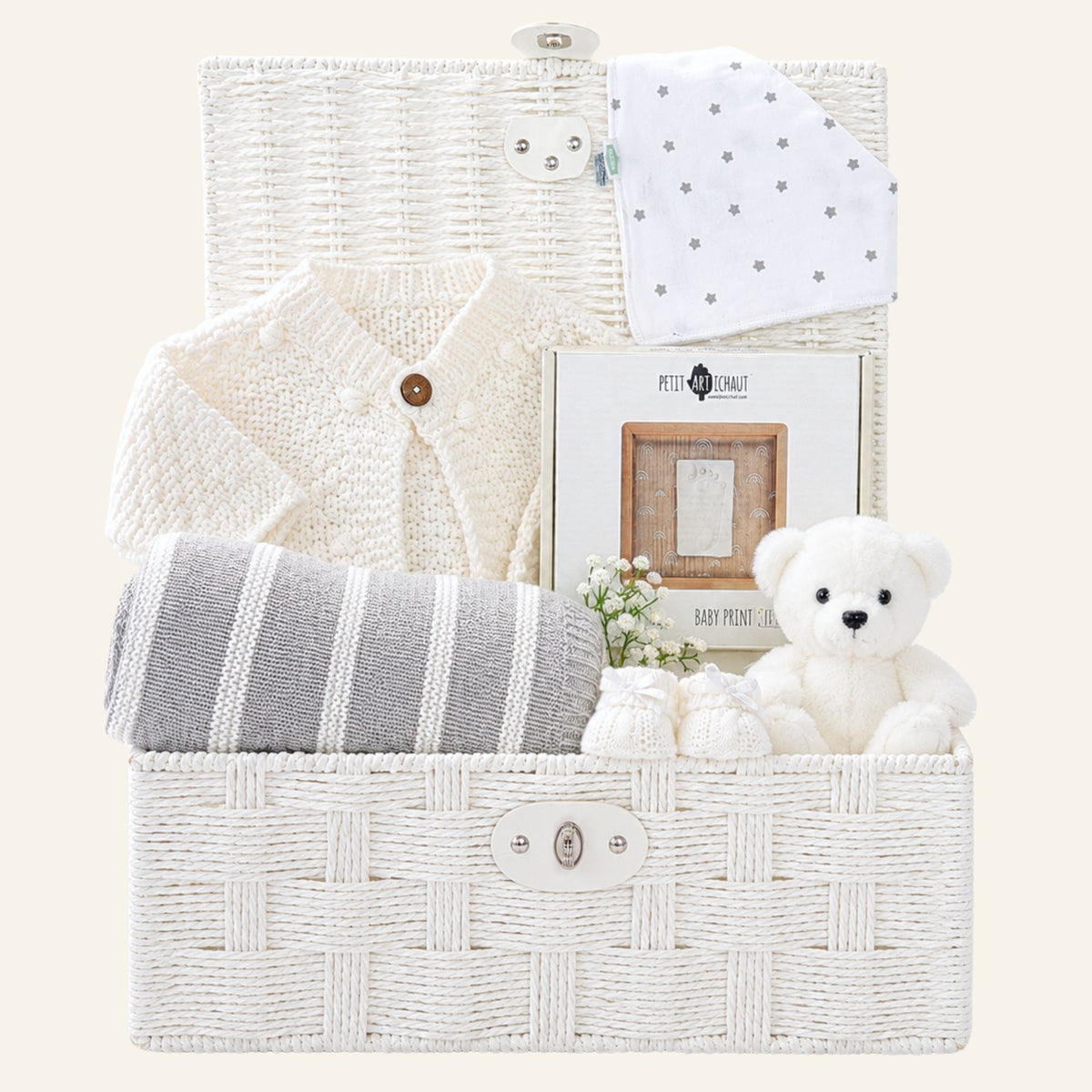 New baby gifts basket with grey and white blanket and baby print frame