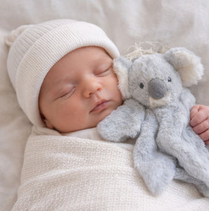 A soft toy comforter koala for a baby