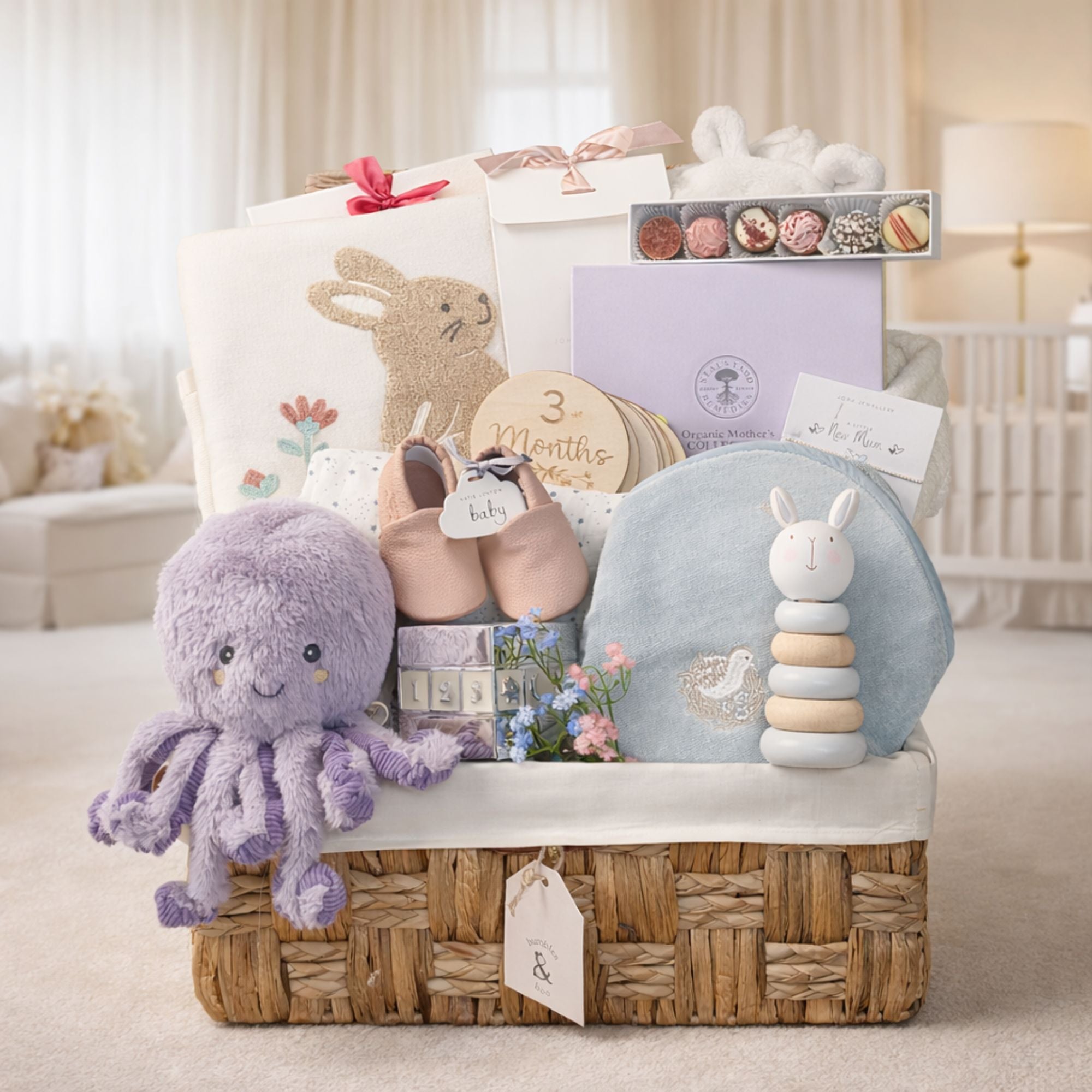 Luxury hamper for a new mum with organic baby essentials and skincare for mum.