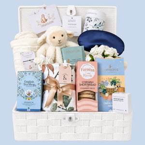 Large mum to be gifts hamper packed with presents including white lamb soft toy, marvellous mum bracelet and sweet treats in a wicker basket by Bumbles and Boo