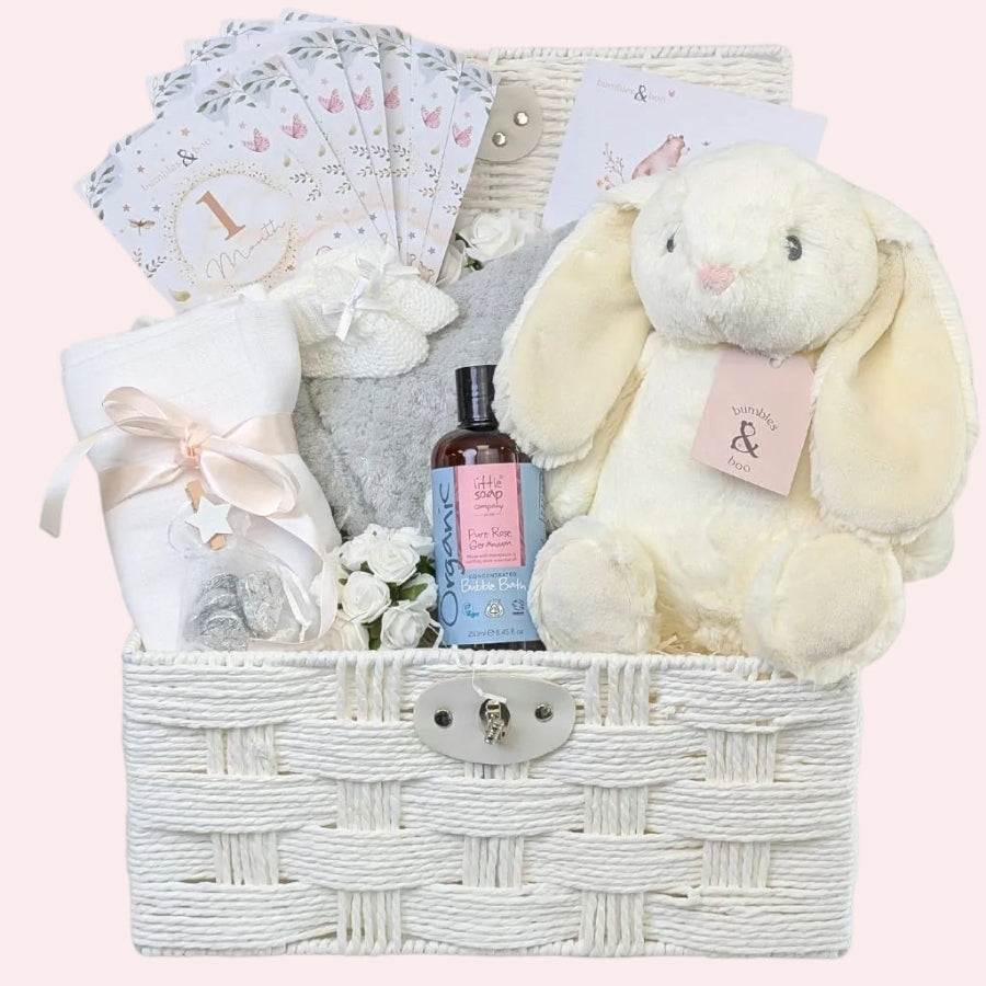 Luxury baby shower gifts hamper featuring pampering treats for mum-to-be and presents for baby.