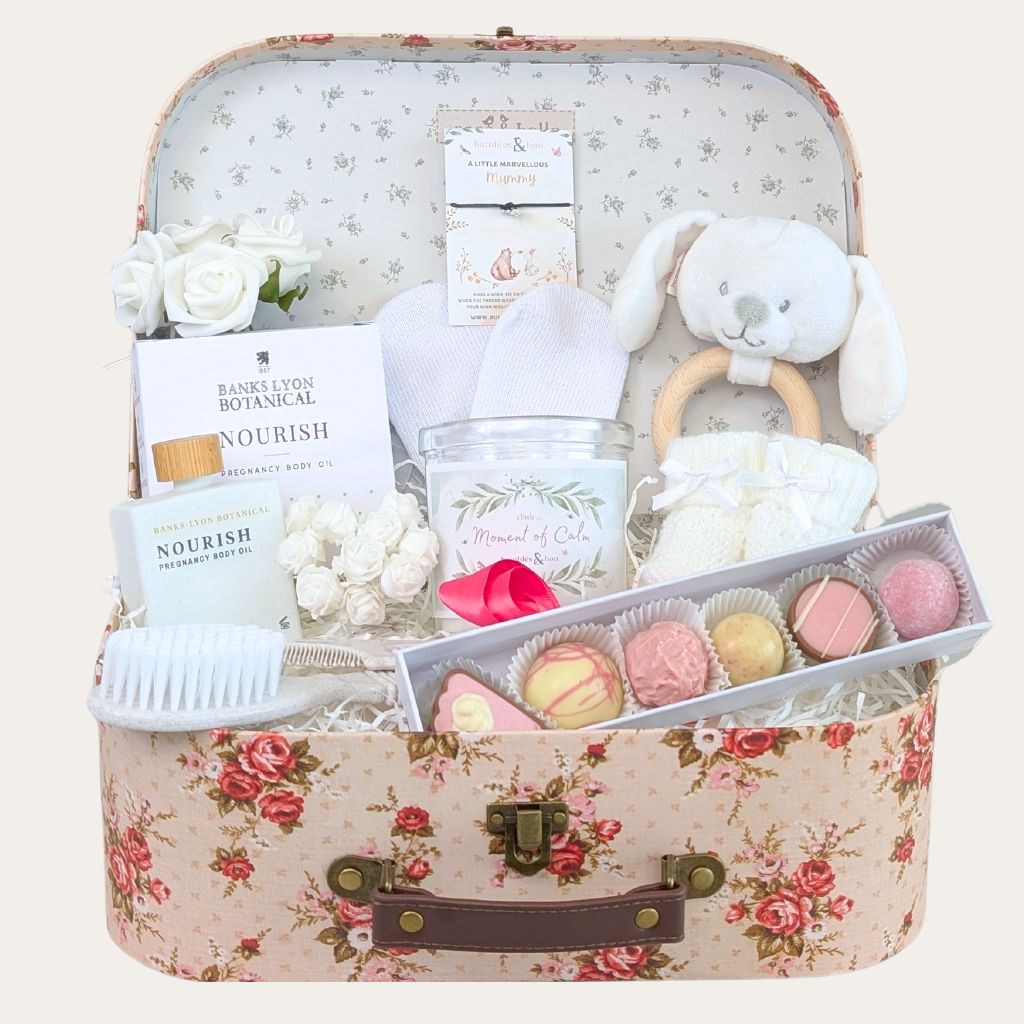 Beautiful floral gifts hamper for Mum to Be including pamper presents and treats for pregnancy including chocolates.