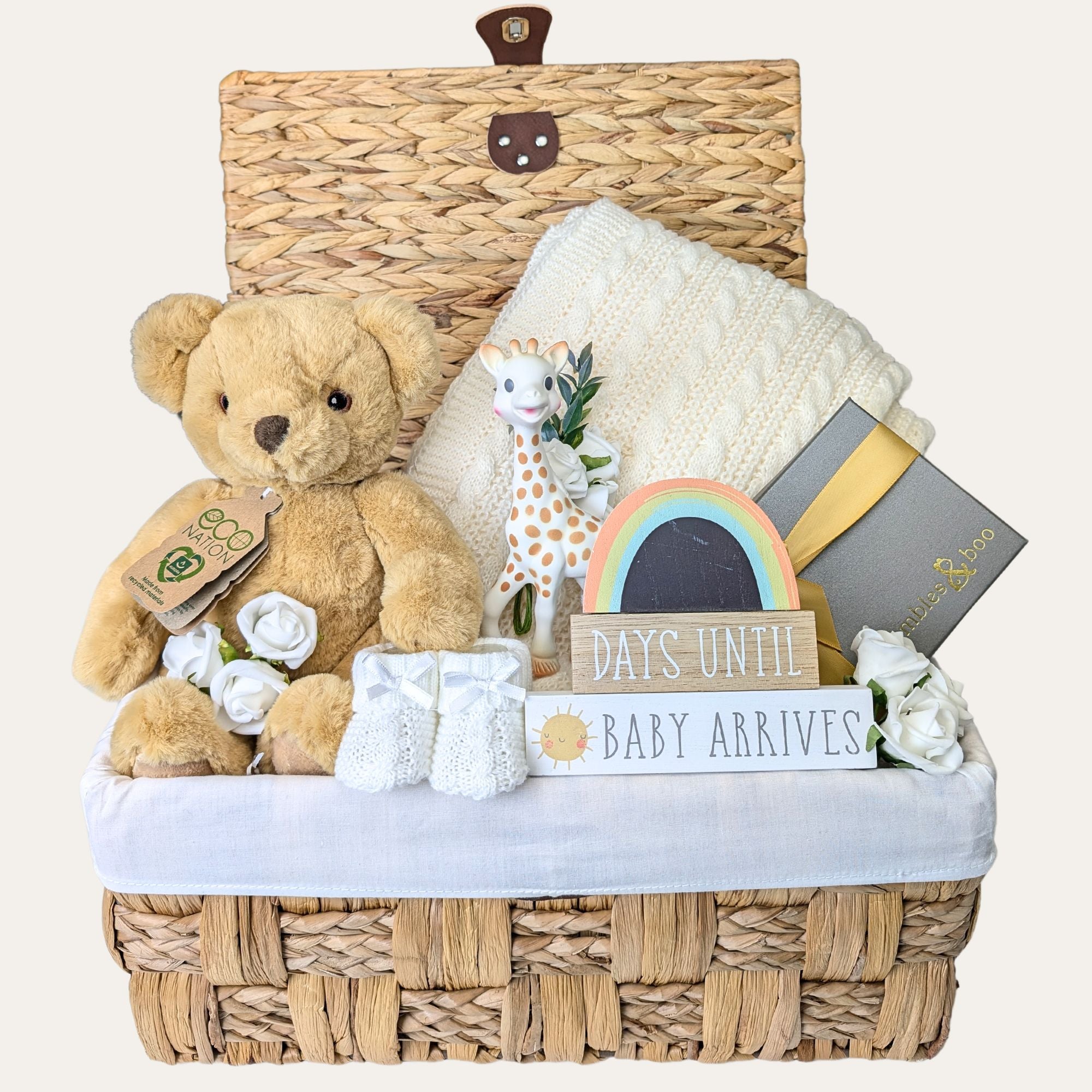 Mum to be gifts hamper with presents including a teddy bear and rainbow pregnancy countdown plaque designed by Bumbles and Boo.
