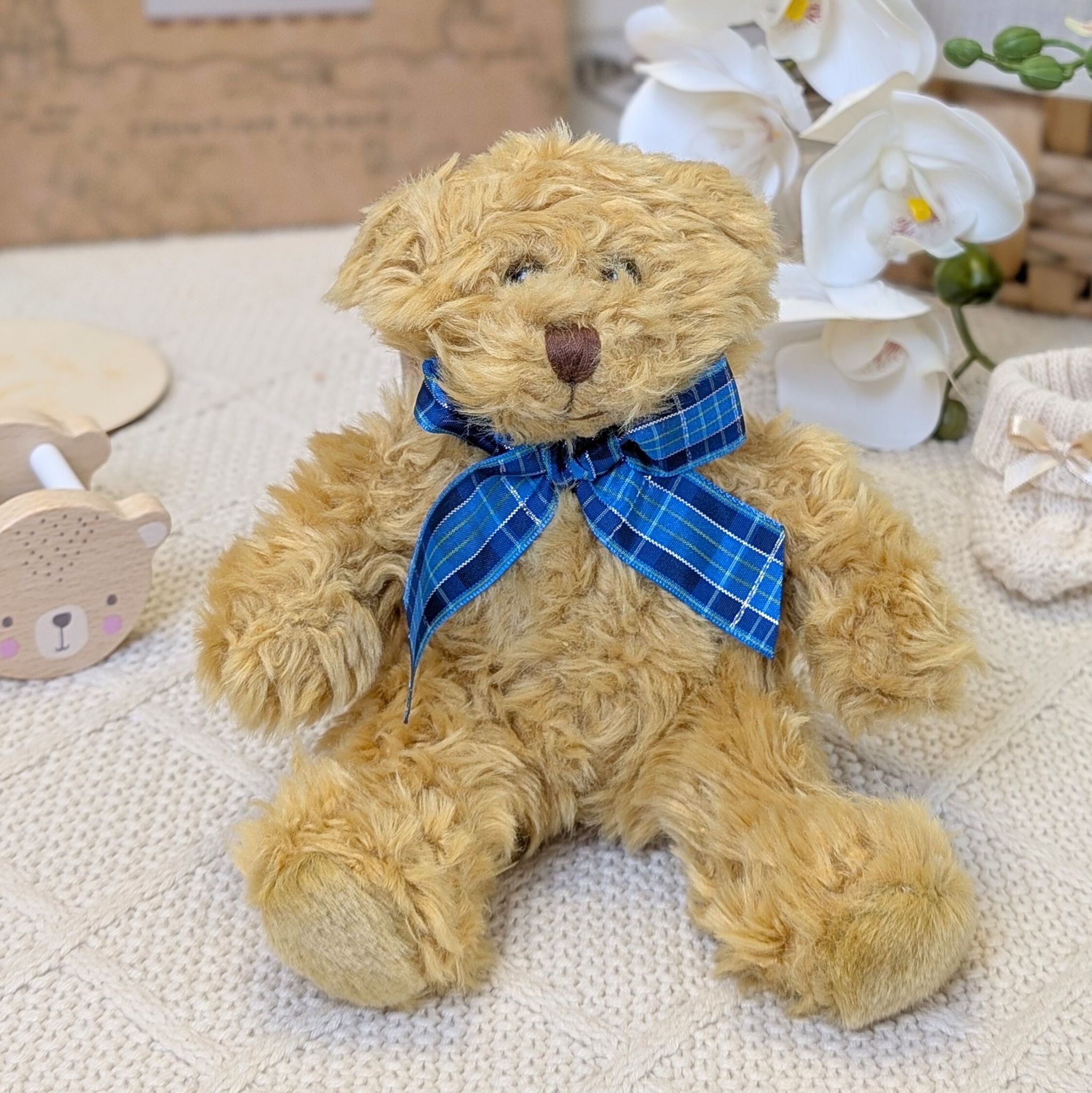Teddy bear with a blue bow tie