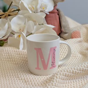 White mug with pink letter 'M' and word 'Mummy'