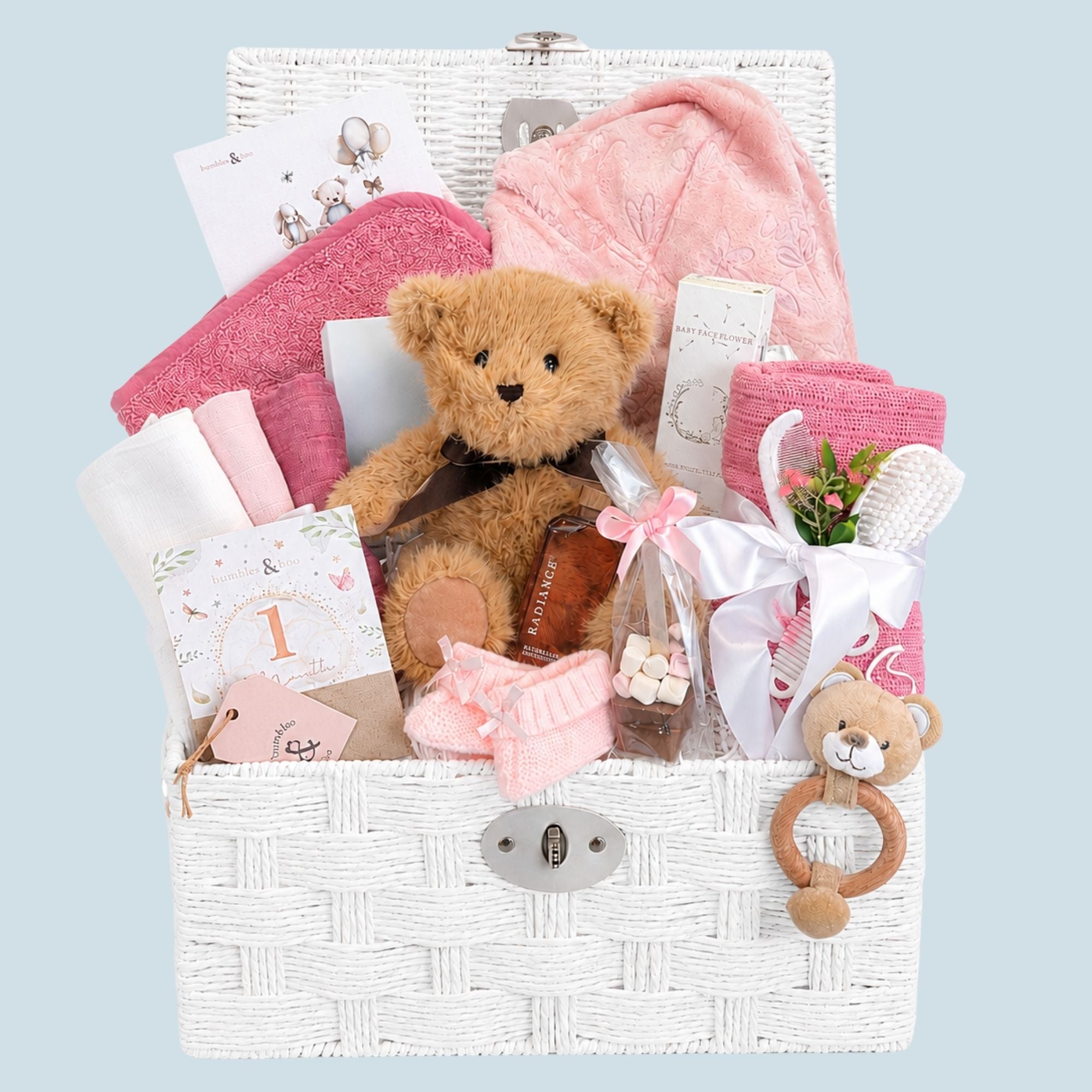 Mummy to be gifts hamper with teddy bear, blush pink bath robe and hooded towel in a white basket