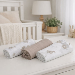 white and beige baby muslin squares