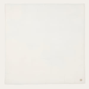 Muslin swaddles in sea green and ivory for baby