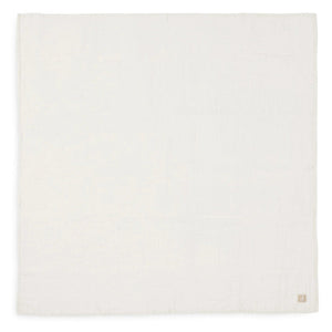 Flatlay of Biscuit and Ivory baby muslins – neutral cotton set