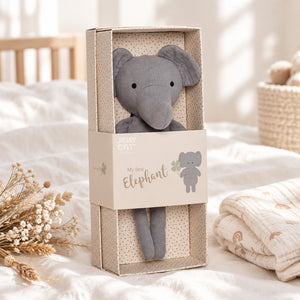 Grey My First Elephant baby soft toy with large ears and long legs, presented in its patterned gift box.