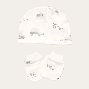 Baby hat and scratch mitts in white with grey animal pattern.