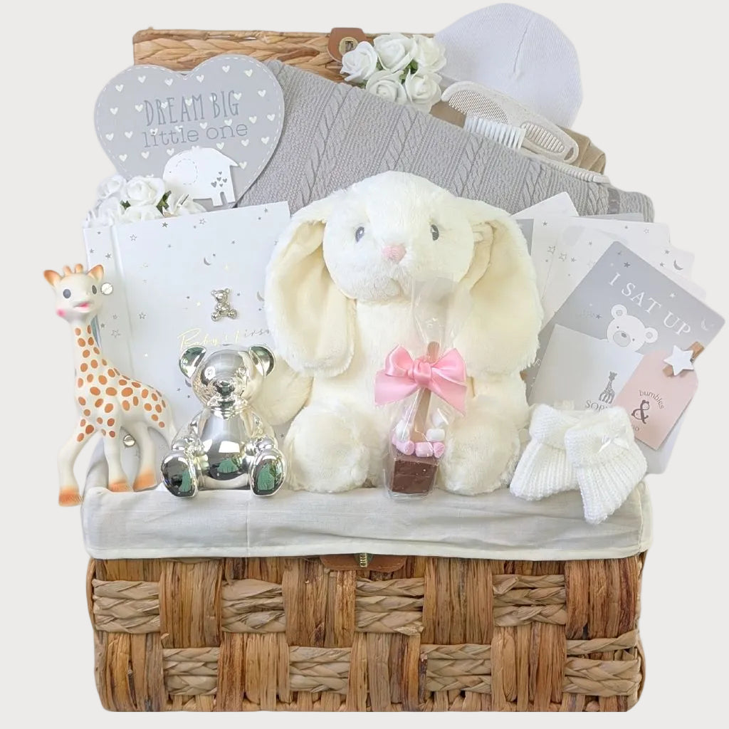 Baby gifts hamper in Neutral tones filled with presents, treats and gifts for baby.