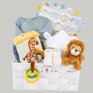New baby gifts hamper which includes gifts of a baby bath robe, jungle themed activity cube and clothing