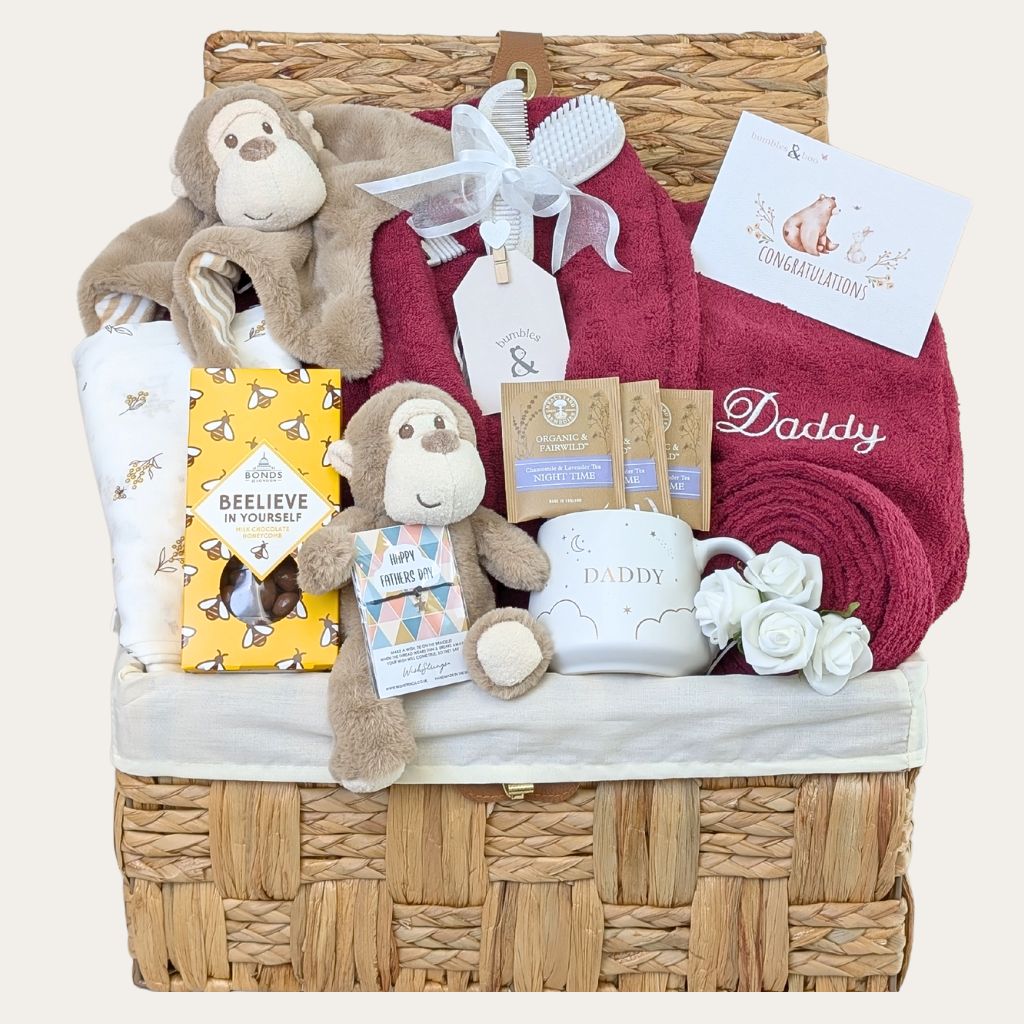 New dad gift hamper with thoughtful presents and keepsakes – perfect gifts for new fathers.