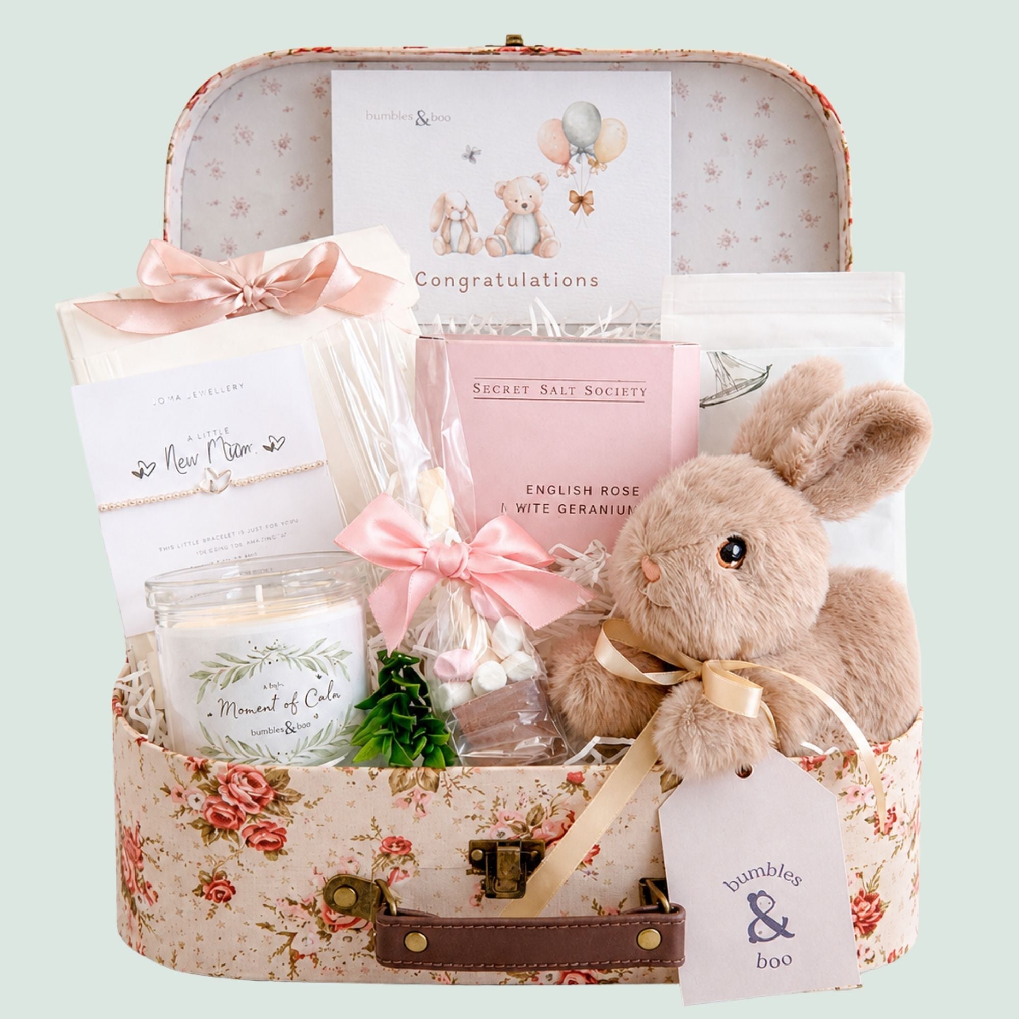 New mother gifts in a vintage hamper with silver bracelet and chocolate.