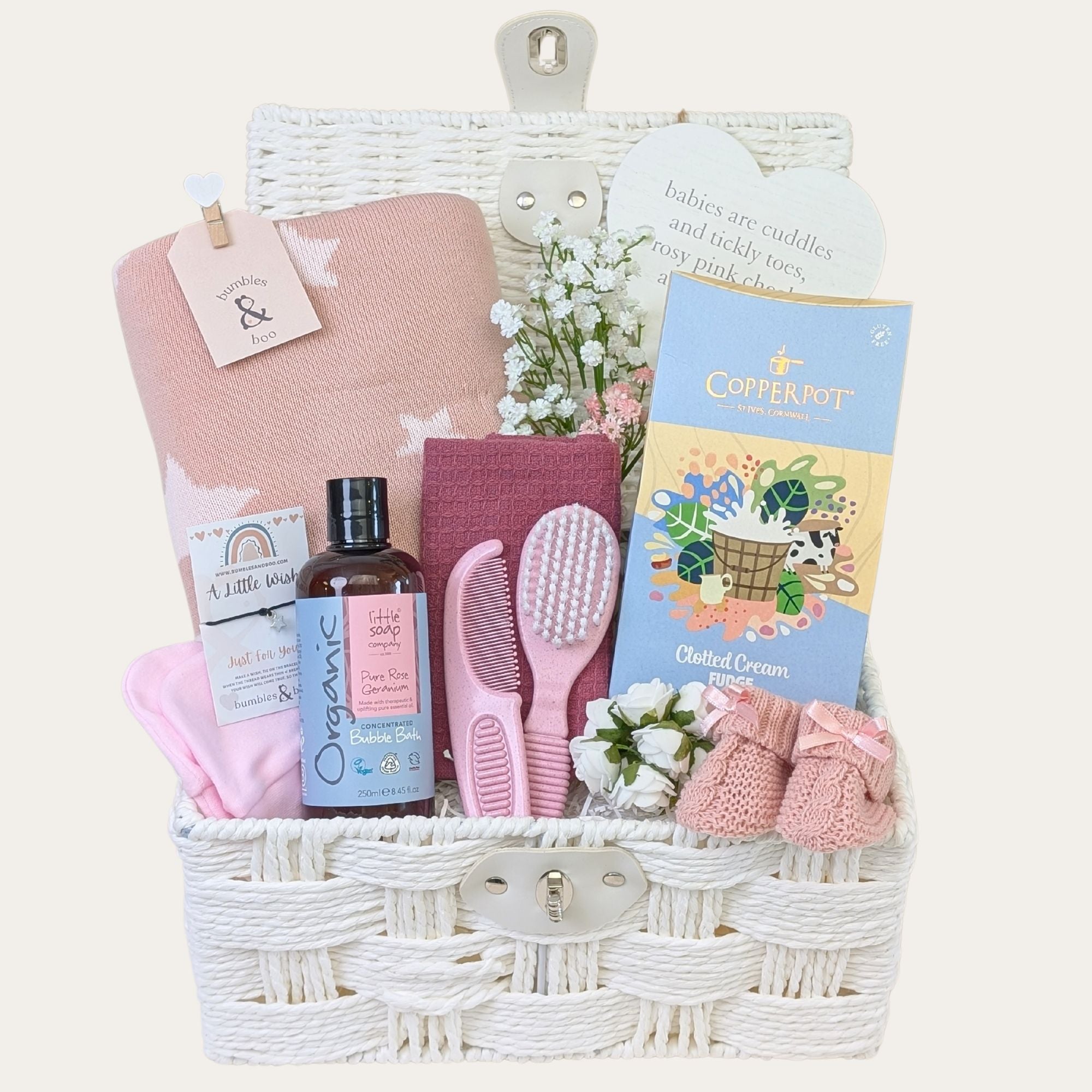 New mum gifts basket with organic skincare, fudge and baby bits packed in a white hamper. Bumbles and Boo.