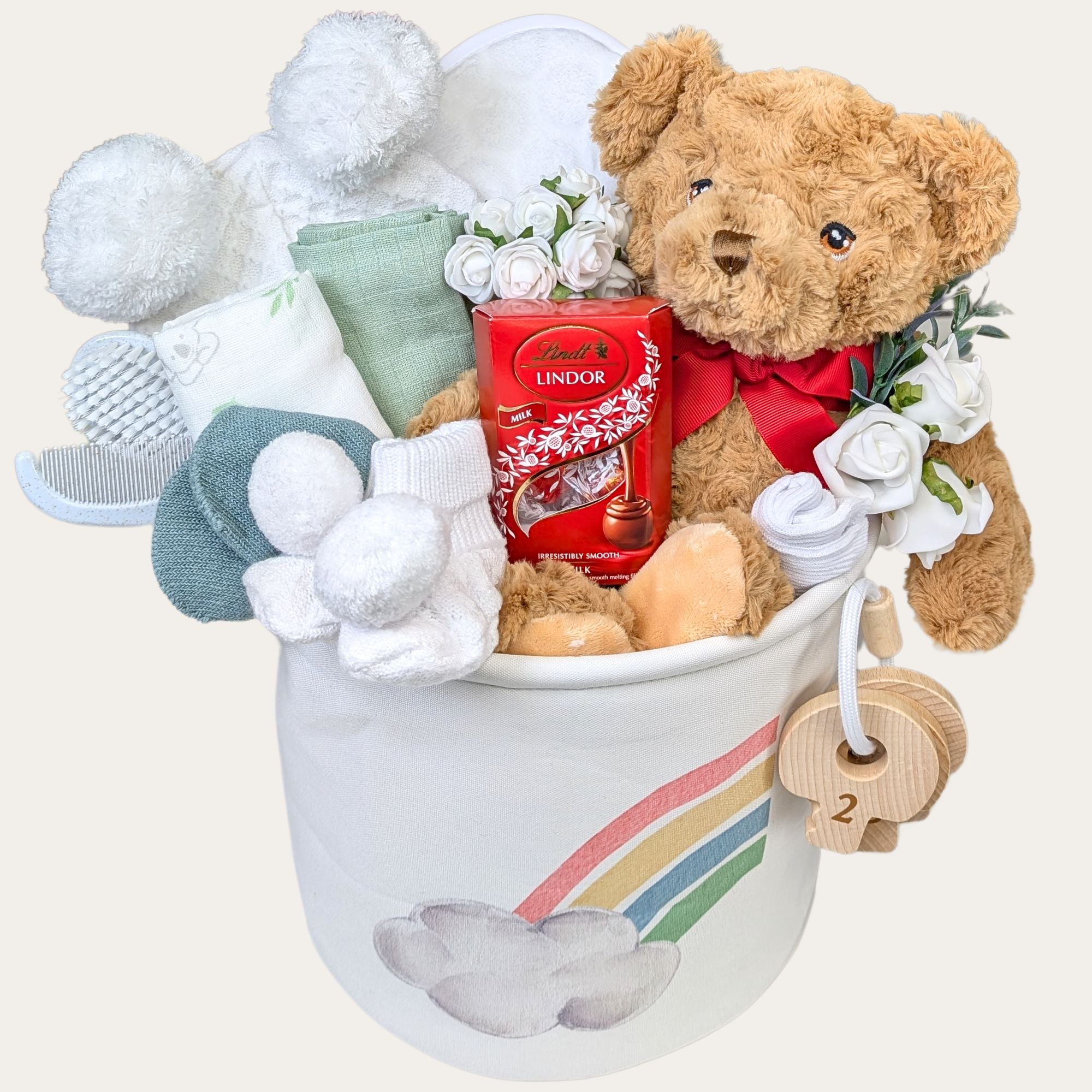 New mum hamper with gifts including chocolate, teddy bear, hooded towel,m and baby products by Bumbles and Boo.