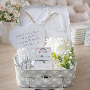 Beautiful present for a new mum with baby essentials and chocolates.
