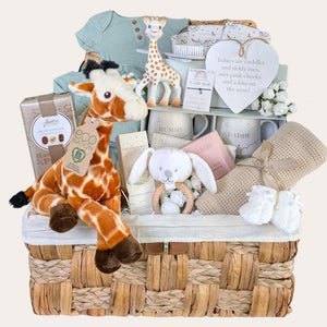 New mum hamper with giraffe theme. Gifts include baby blanket, mum and dad mugs, baby clothing and chocolates. Bumbles and Boo.
