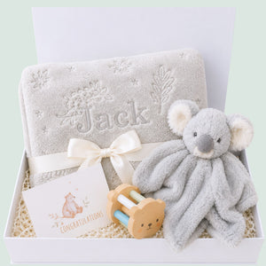 Personalised newborn baby gifts box with grey koala toy and baby blanket.