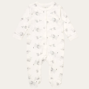 White babygrow onesie with a pattern.