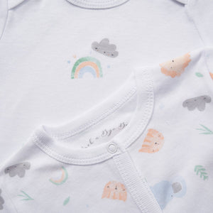 Baby onesie with rainbow and cloud patterns on a white background