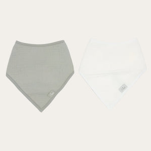 Flatlay of Olive Green and Oatmeal muslin bibs – stylish baby essentials
